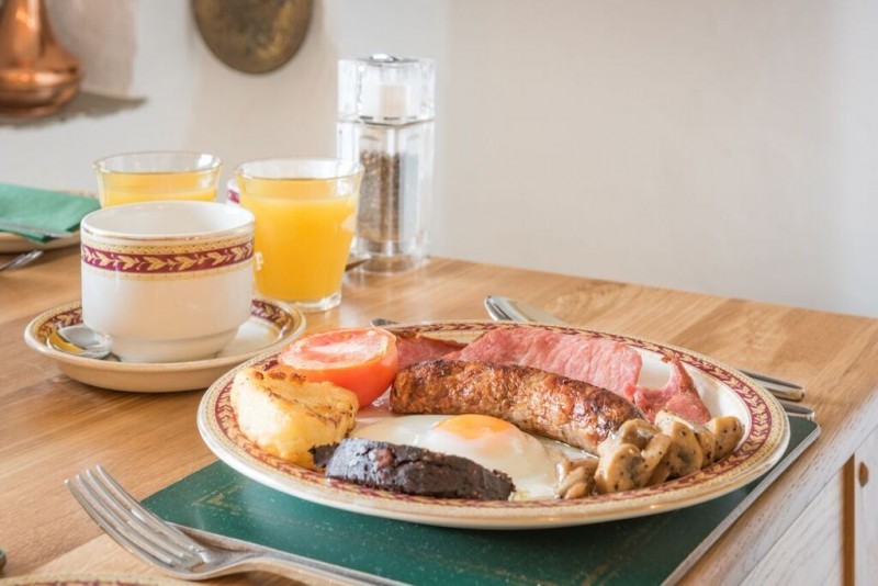 Tuck into a breakfast of local produce, including our butcher's own hand-cured and cut bacon and handmade sausages. 