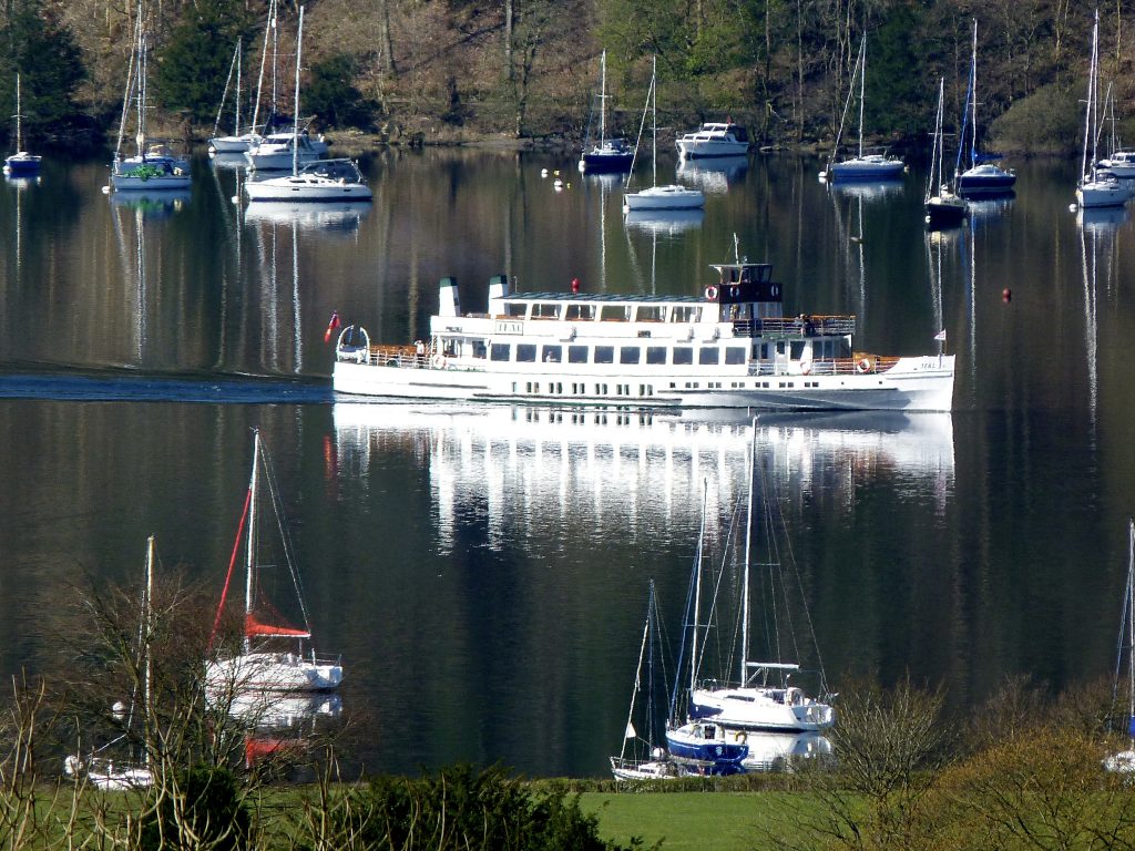 Photo taken from Blenheim Lodge of Windermere Ferry sailing on Lake Windermere 